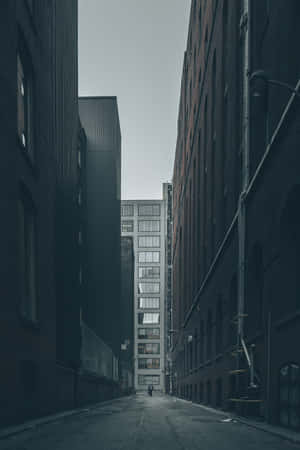 A Peaceful Alleyway In The Heart Of A Vibrant City. Wallpaper