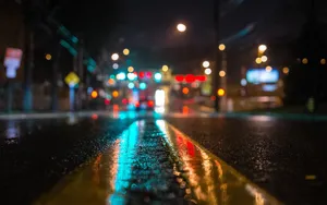 A Peaceful View Of The Hustle And Bustle Of The City Street Wallpaper