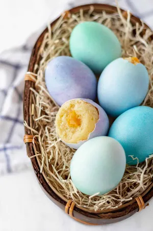 A Perfectly Pristine Eggshell Rests Atop A Vibrant White Backdrop. Wallpaper