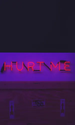 A Person Experiencing Emotional Pain And Sorrow Wallpaper