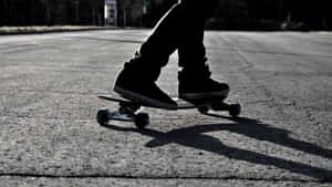 A Person Riding A Skateboard Wallpaper