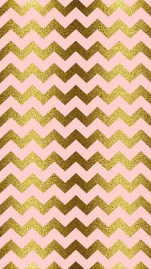 A Pink And Gold Chevron Pattern Wallpaper
