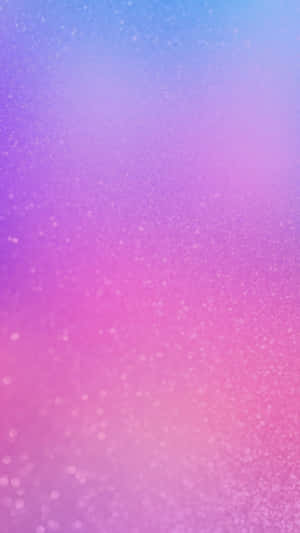 A Pink And Purple Blurred Background With Hearts Wallpaper