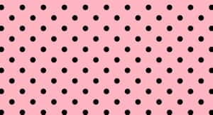 A Pink Background With Black Dots Wallpaper