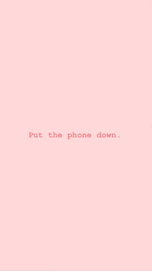 A Pink Background With The Words Put The Phone Down Wallpaper