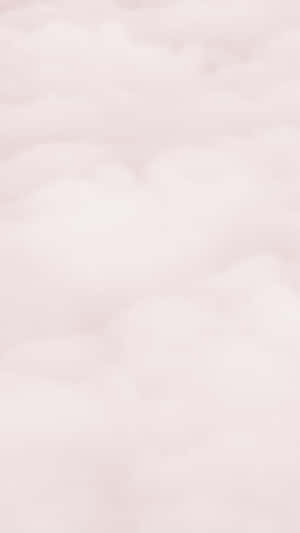 A Pink Cloud With A Plane Flying Over It Wallpaper