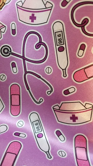 A Pink Fabric With A Nurse And Medicine On It Wallpaper