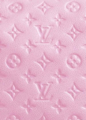 A Pink Louis Vuitton Purse Adding A Pop Of Color To An Outfit. Wallpaper