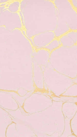 A Pink Marble Background With Gold Paint Wallpaper