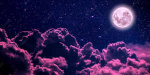 A Pink Moon In The Sky With Clouds Wallpaper