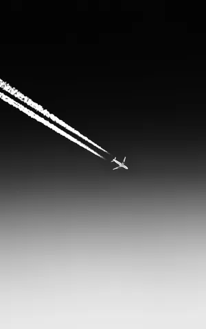 A Plane Flying In The Sky Wallpaper