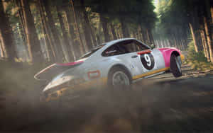 A Porsche 911 Racing Car In The Woods Wallpaper