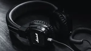 A Powerful Black And White Music-themed Background Wallpaper