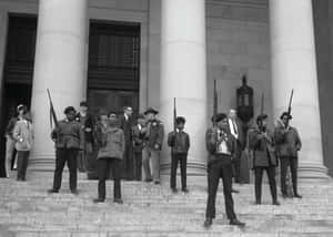 A Powerful Moment At The Formation Of The Black Panther Party Wallpaper