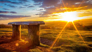 A Precious Moment Of Sunrise At A Monolith. Wallpaper