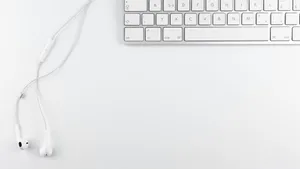 A Pristine White Laptop Provides The Perfect Aesthetic To Spark Creative Inspiration. Wallpaper