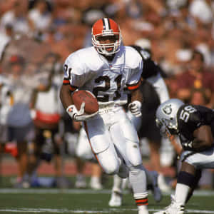 A Professional Nfl Running Back In Action Wallpaper
