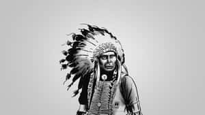 A Proud, Proud Native American Indian In Traditional Attire. Wallpaper