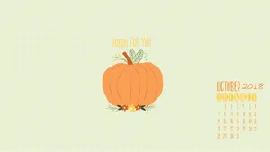 A Pumpkin Calendar With A Leaf And Flowers Wallpaper