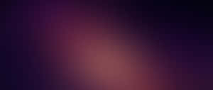 A Purple And Purple Blurred Background Wallpaper