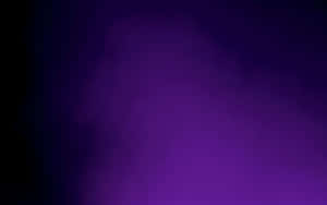 A Purple Light Is Shining On A Black Background Wallpaper