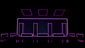 A Purple Light Is Shown In A Dark Room Wallpaper