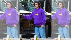 A Purple Sweatshirt, Perfect For Lounging In Comfort And Style. Wallpaper