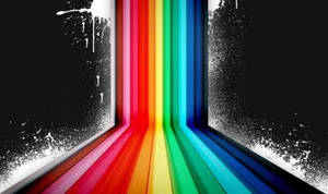 A Rainbow Colored Background With Paint Splatters Wallpaper