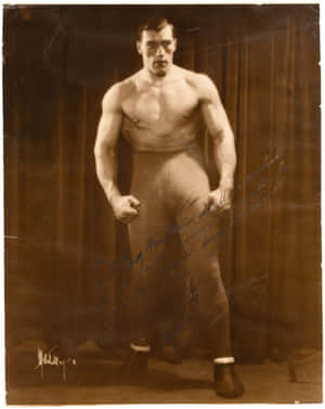 A Rare Signed Collector's Card Of Italian Boxer Primo Carnera. Wallpaper