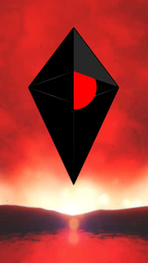 A Red And Black Diamond With A Sun In The Background Wallpaper