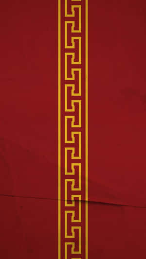A Red And Yellow Pattern On A Red Background Wallpaper