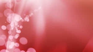 A Red Background With Bokeh Lights Wallpaper