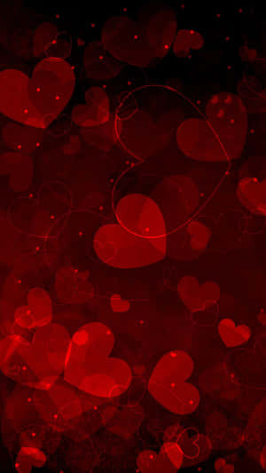 A Red Background With Many Hearts Wallpaper