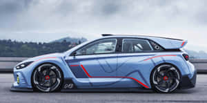 A Red Hatchback Car On A Road Wallpaper