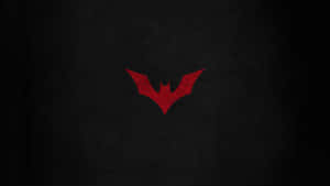 A Red Logo On A Black Background Wallpaper