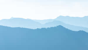 A Relaxing Blue Background Perfect For A Calming Atmosphere Wallpaper