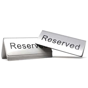 A Reserved Table Sign On A Restaurant Dining Table Wallpaper