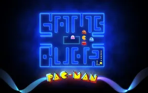 A Retro Revival: Pacman In Action Wallpaper