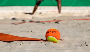 A Riveting Game Of Beach Tennis Wallpaper