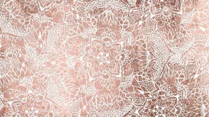 A Rose Gold And White Lace Pattern Wallpaper