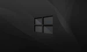 A Row Of Black Windows With Glass Reflections Wallpaper