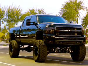 A Ruggedly Handsome Lifted Truck Wallpaper