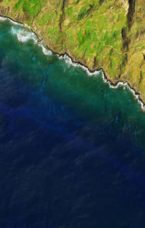 A Satellite Image Of The Ocean And A Beach Wallpaper