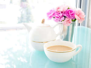 A Scenic Image Of A Calm And Peaceful Sunset Over A Large Body Of Still Water Wallpaper