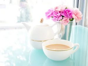 A Scenic Image Of A Calm And Peaceful Sunset Over A Large Body Of Still Water Wallpaper