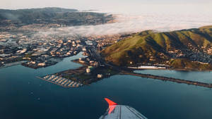 A Scenic View From A Plane Window Wallpaper