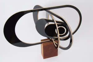 A Sculpture Making Kinetic Art That Is Truly Mesmerizing And Captivating. Wallpaper