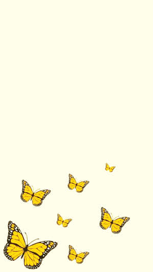A Sea Of Cute Yellow Butterflies Wallpaper