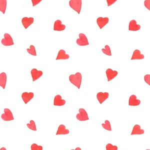 A Seamless Heart Pattern In Vibrant Red Shades Wallpaper