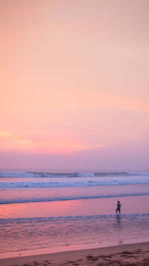 A Serene Afternoon At The Stunning Pink Beach Wallpaper